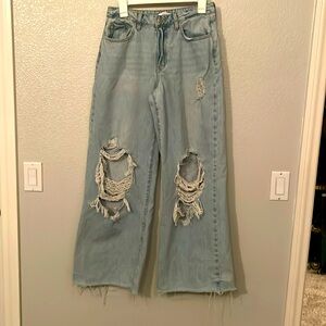 Wide leg ripped blue jeans